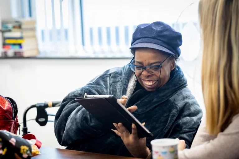 A woman using a tablet computer